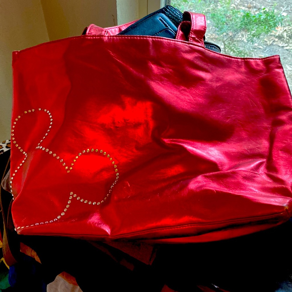 Red Mickey Mouse purse with rhinestones.